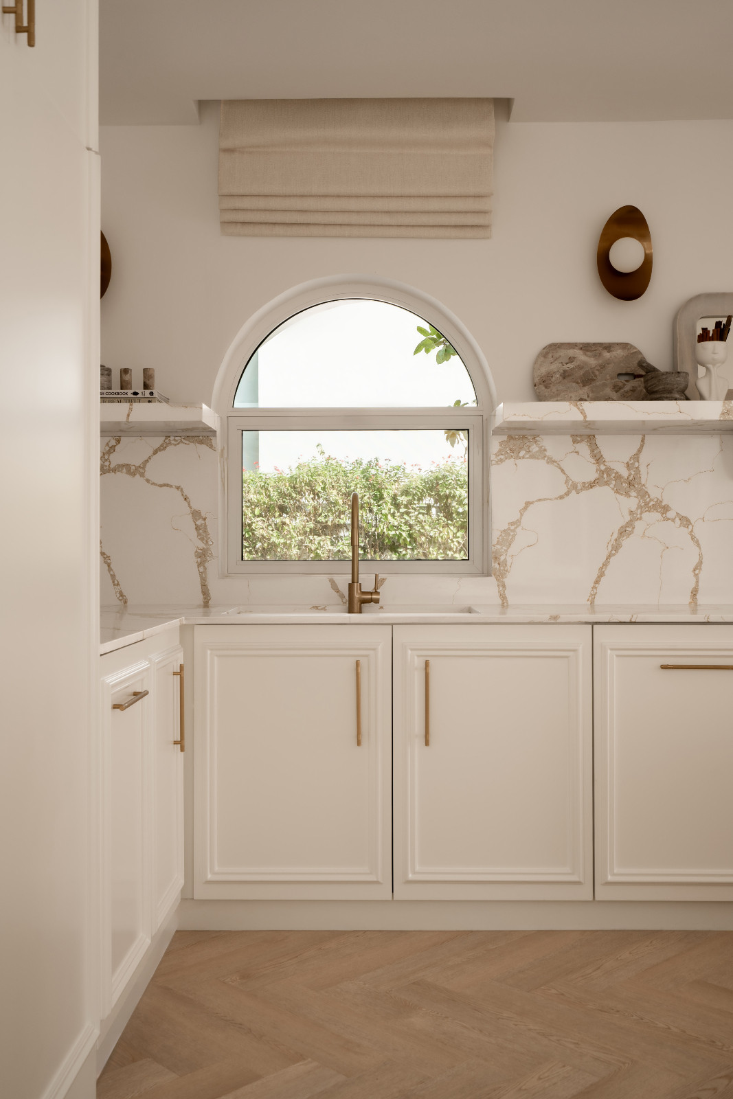 Yellow-gold accents add warmth without disrupting the architectural balance