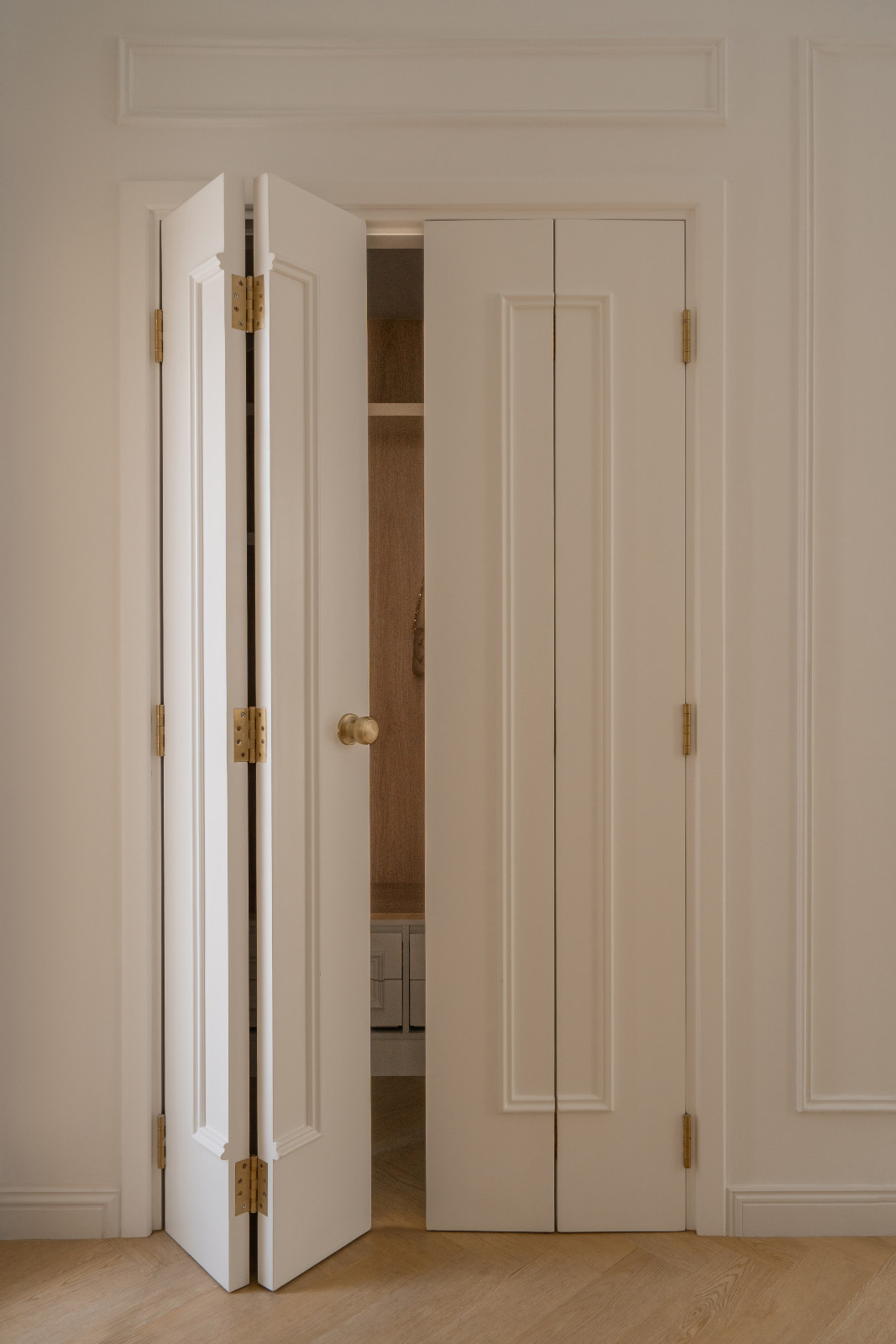 Foldable wardrobe doors keep the visual clutter-free