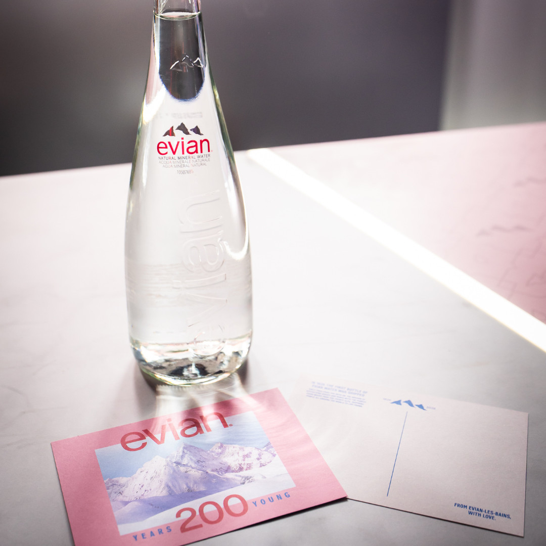 An Evian natural mineral water bottle