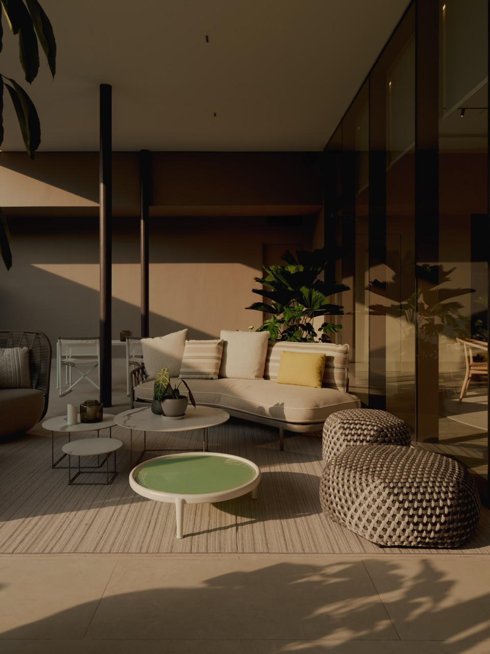 Outdoor furniture by B&B Italia, designed by greats like Antonio Citterio, furnishes the covered terrace lounge