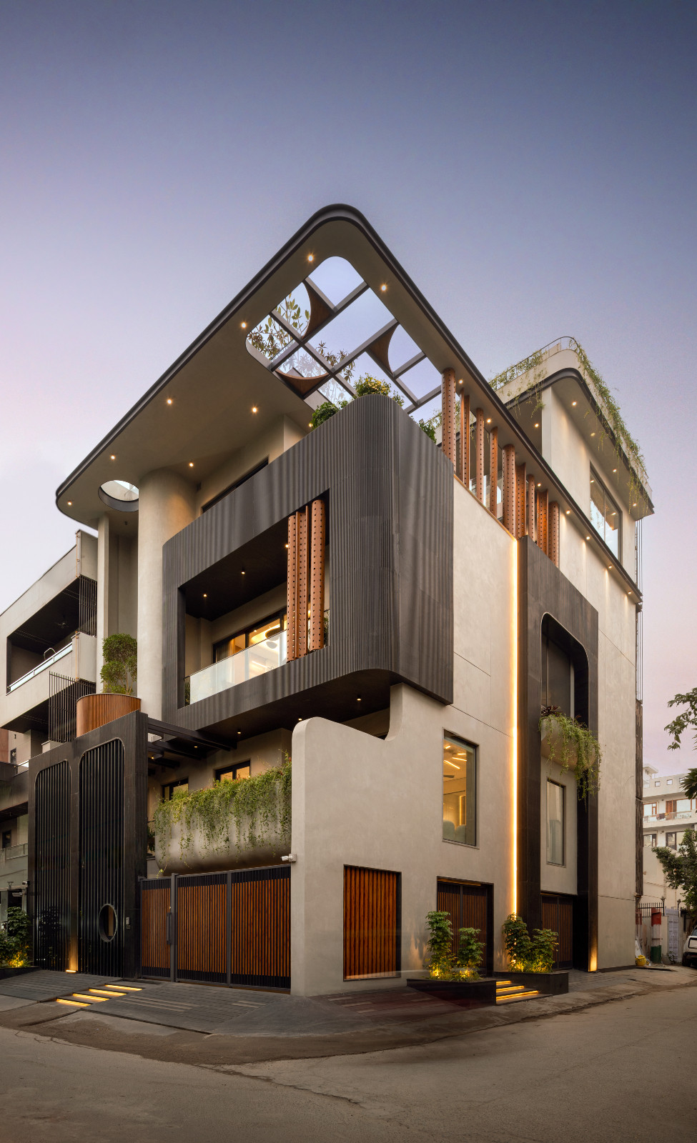 An external shot of an avant-garde family home with brutalist elements in New Delhi, India designed by Spaces Architects @KA