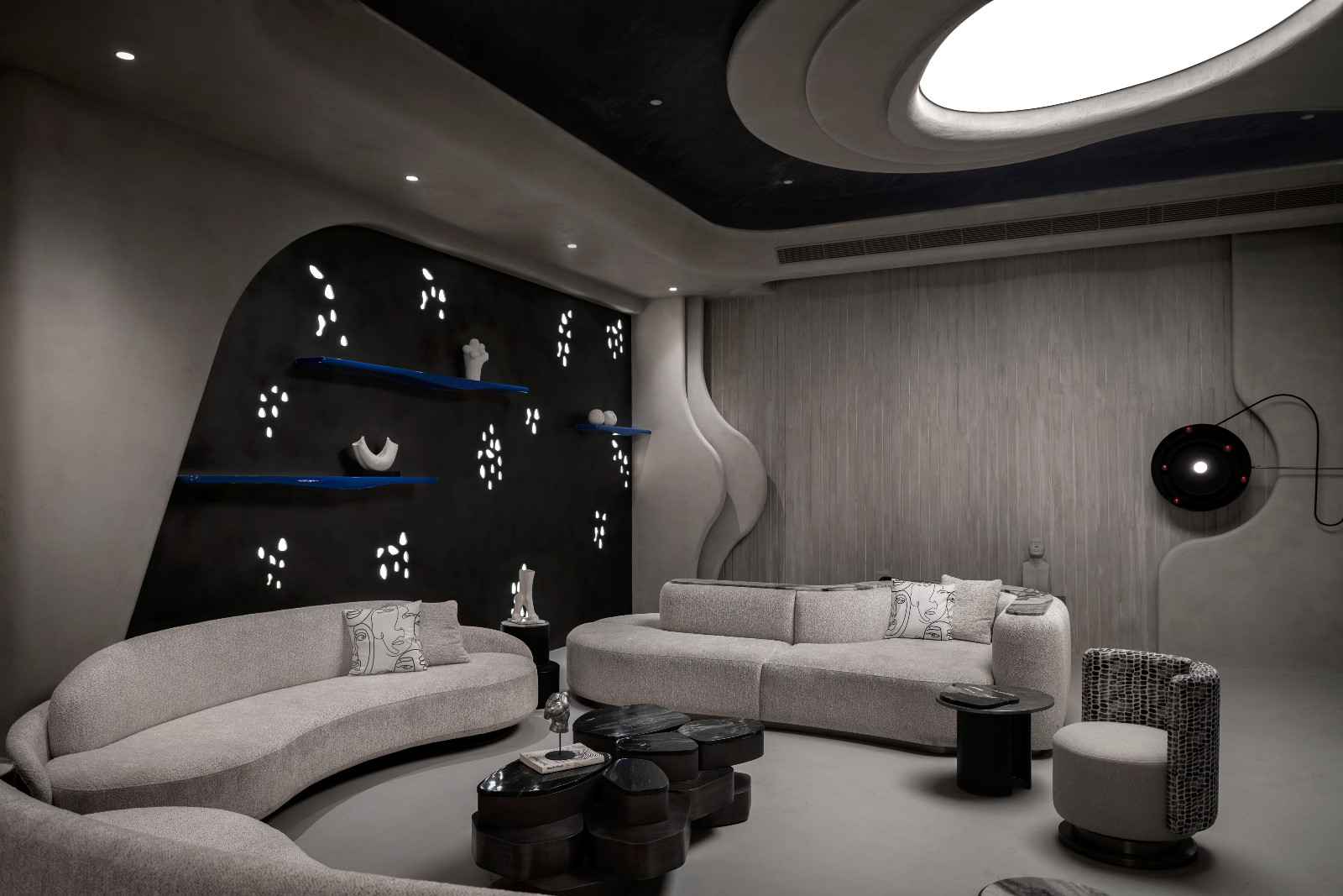 The living room of an avant-garde family home with brutalist elements in New Delhi, India designed by Spaces Architects @KA