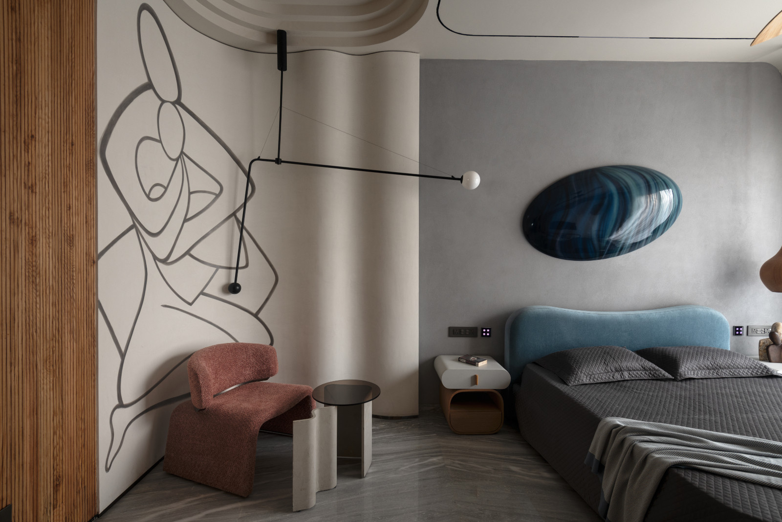 The bedroom of an avant-garde family home with brutalist elements in New Delhi, India designed by Spaces Architects @KA