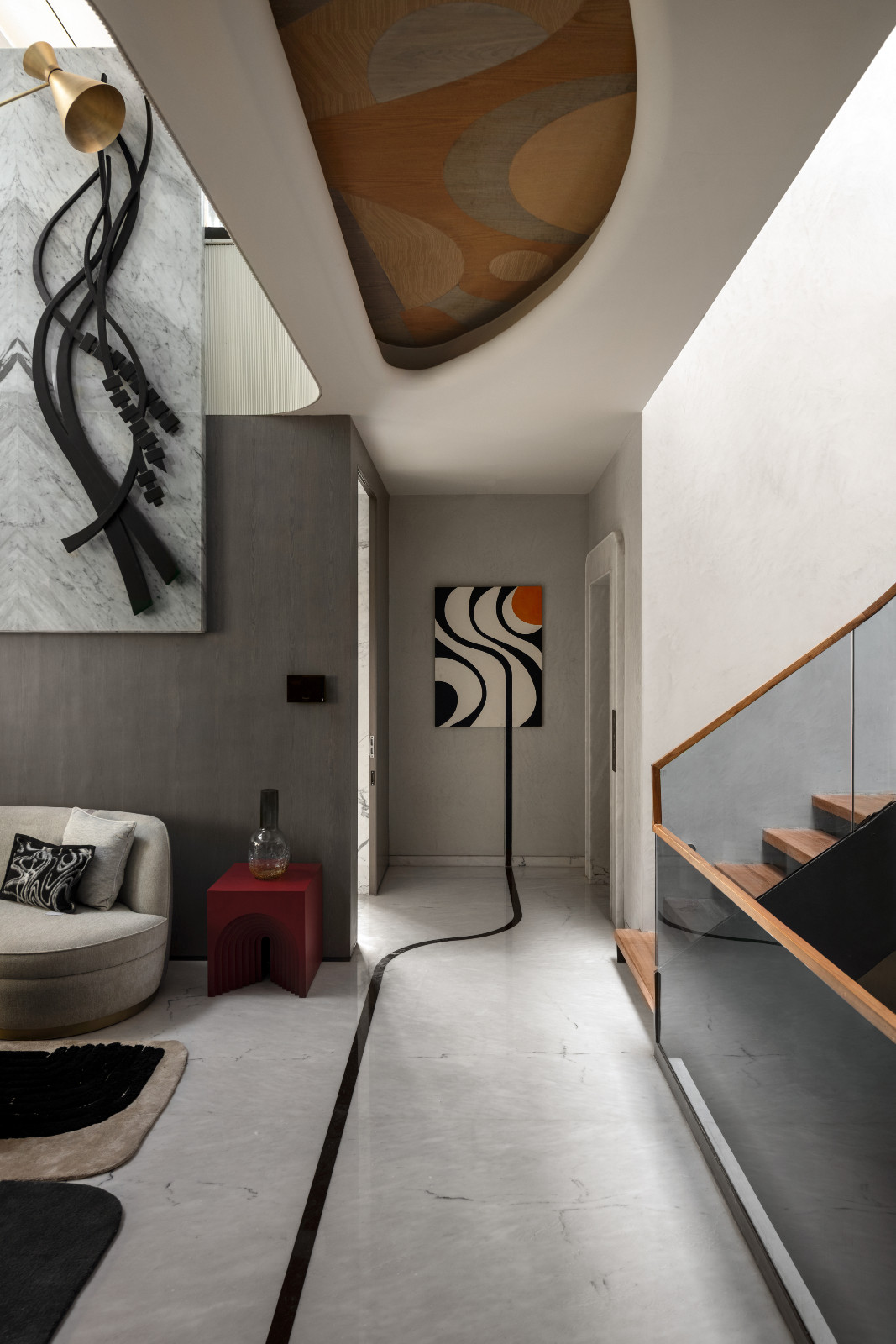 The living room of an avant-garde family home with brutalist elements in New Delhi, India designed by Spaces Architects @KA