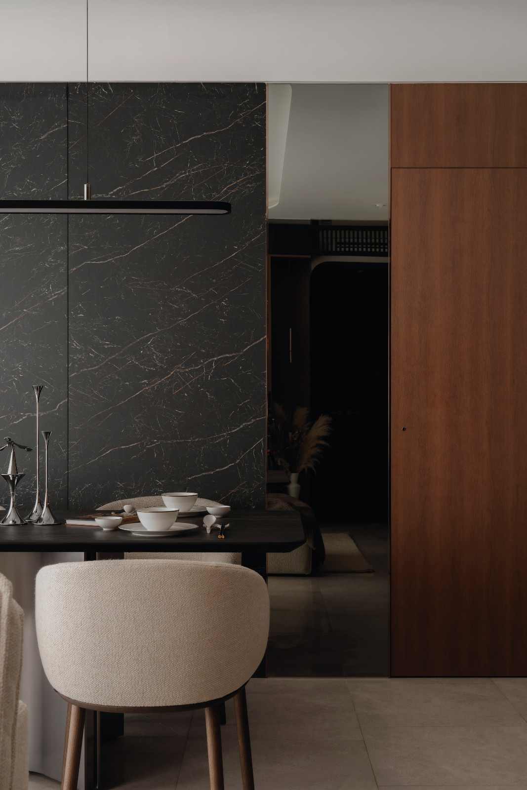 Like the kitchen island, the custom dining table top was made with material from Cosentino