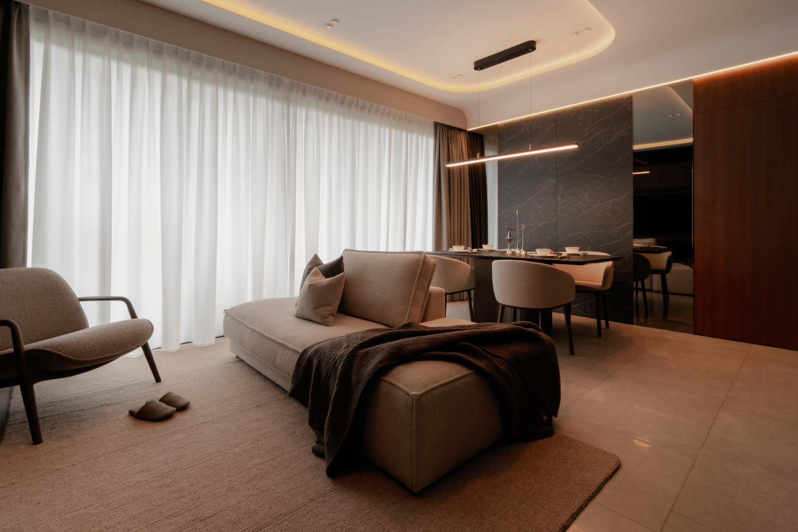 The dining area is positioned close to integrated storage solutions