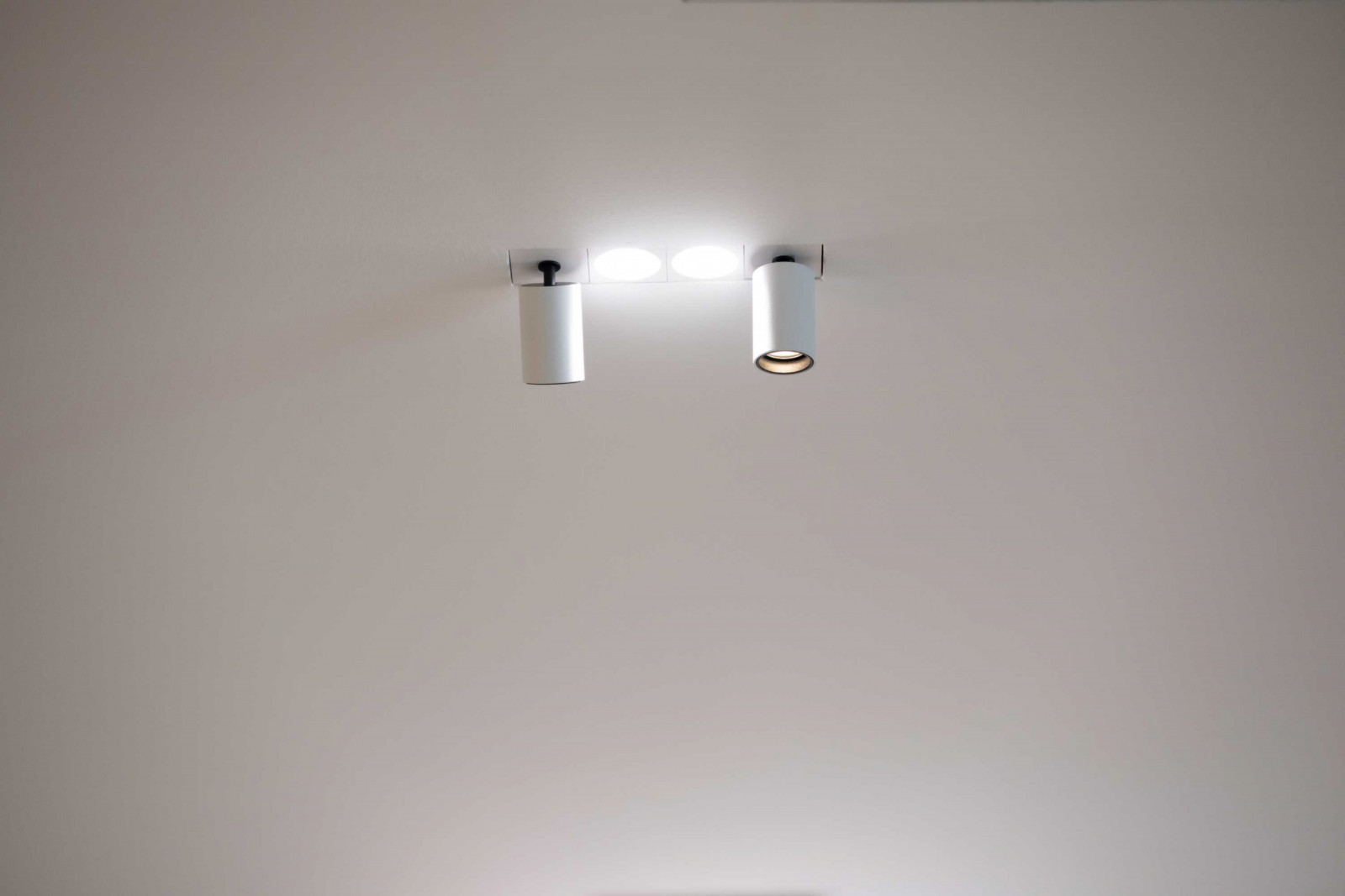 Here, the Chandelle lights from Lune Brillante are surface mounted