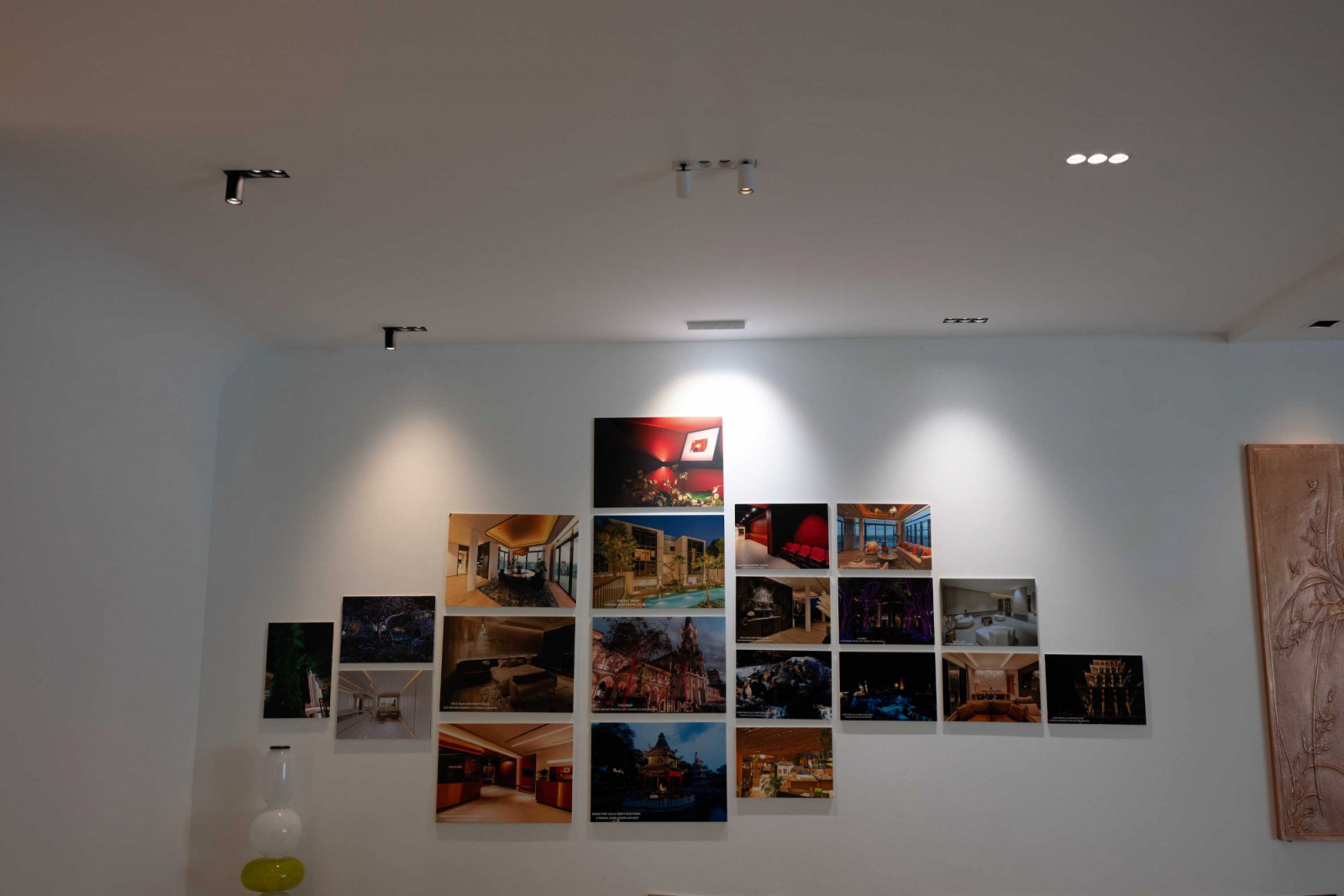 A selection of Lune Brillante lights illuminating a photo gallery
