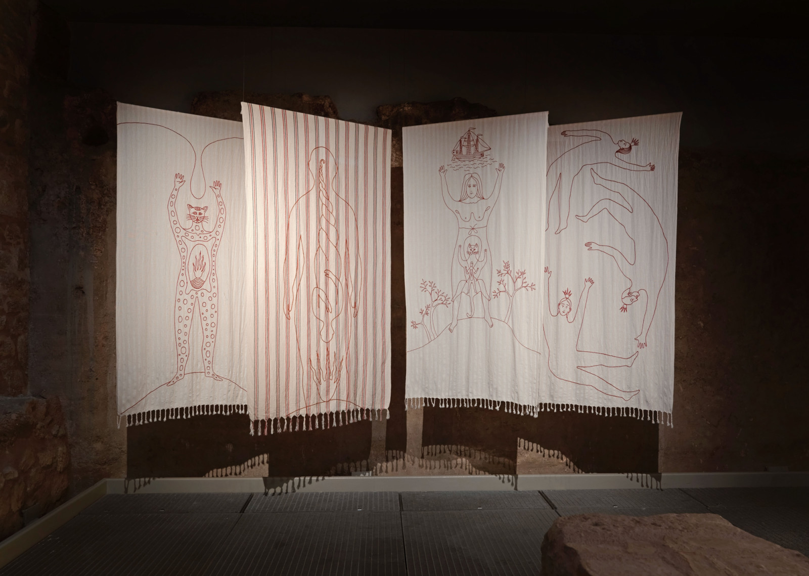 Ship figure and circle of bodies. Alex Červený, Istanbul (left) and Turkish Bath, both 2026, embroidery on fabric; the ship recalls Barbarossa’s fleet and the graffiti on the cistern walls