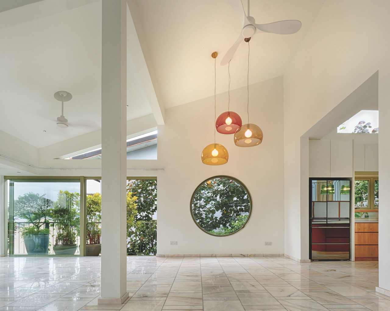 A skyroof over the entry bridge floods the threshold with light