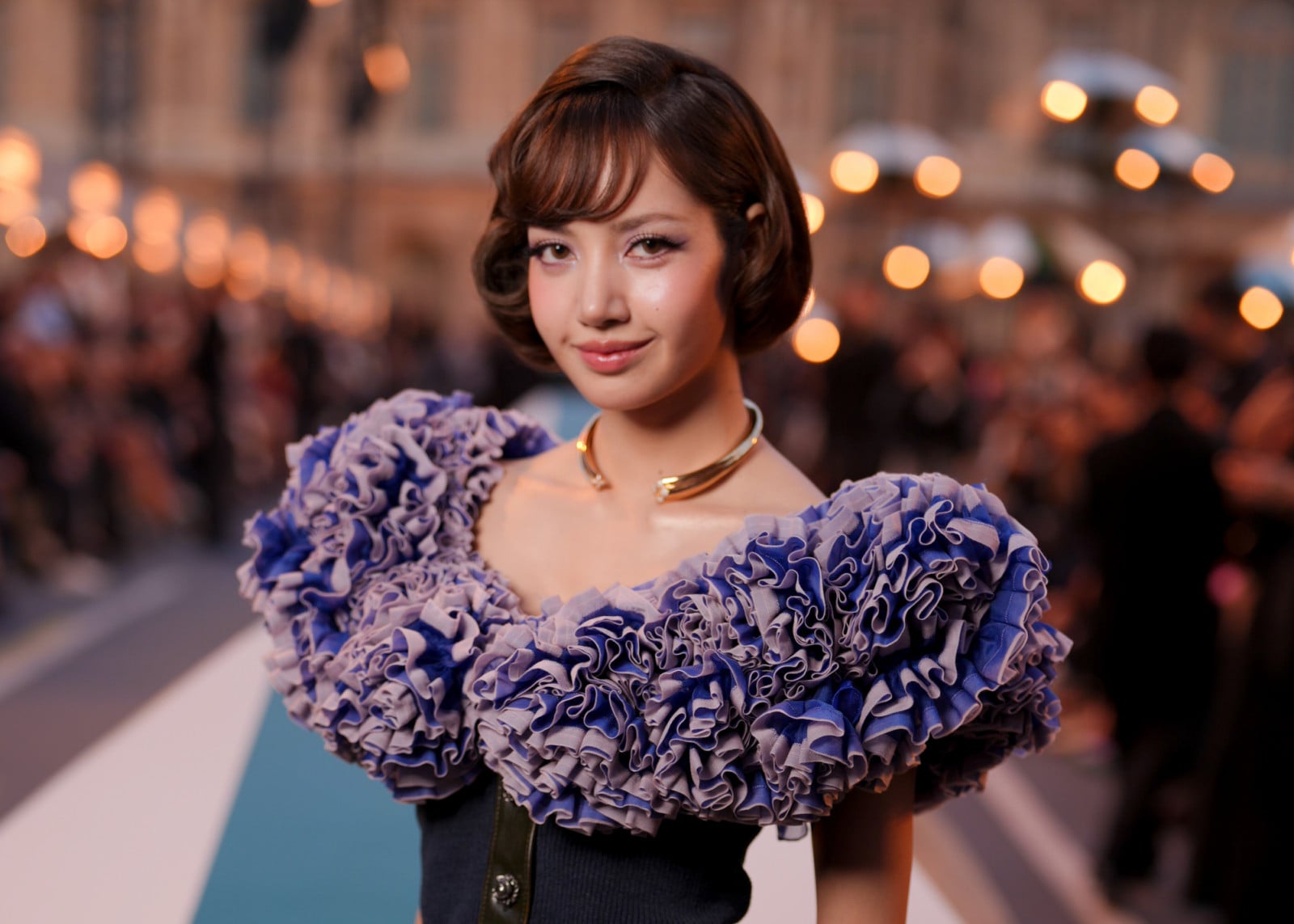Lisa at the Louis Vuitton fashion show as part of Paris RTW Spring/Summer 2027 fashion week held at Le Louvre on October 06, 2026 in Paris, France. (Photo by Swan Gallet/WWD via Getty Images)