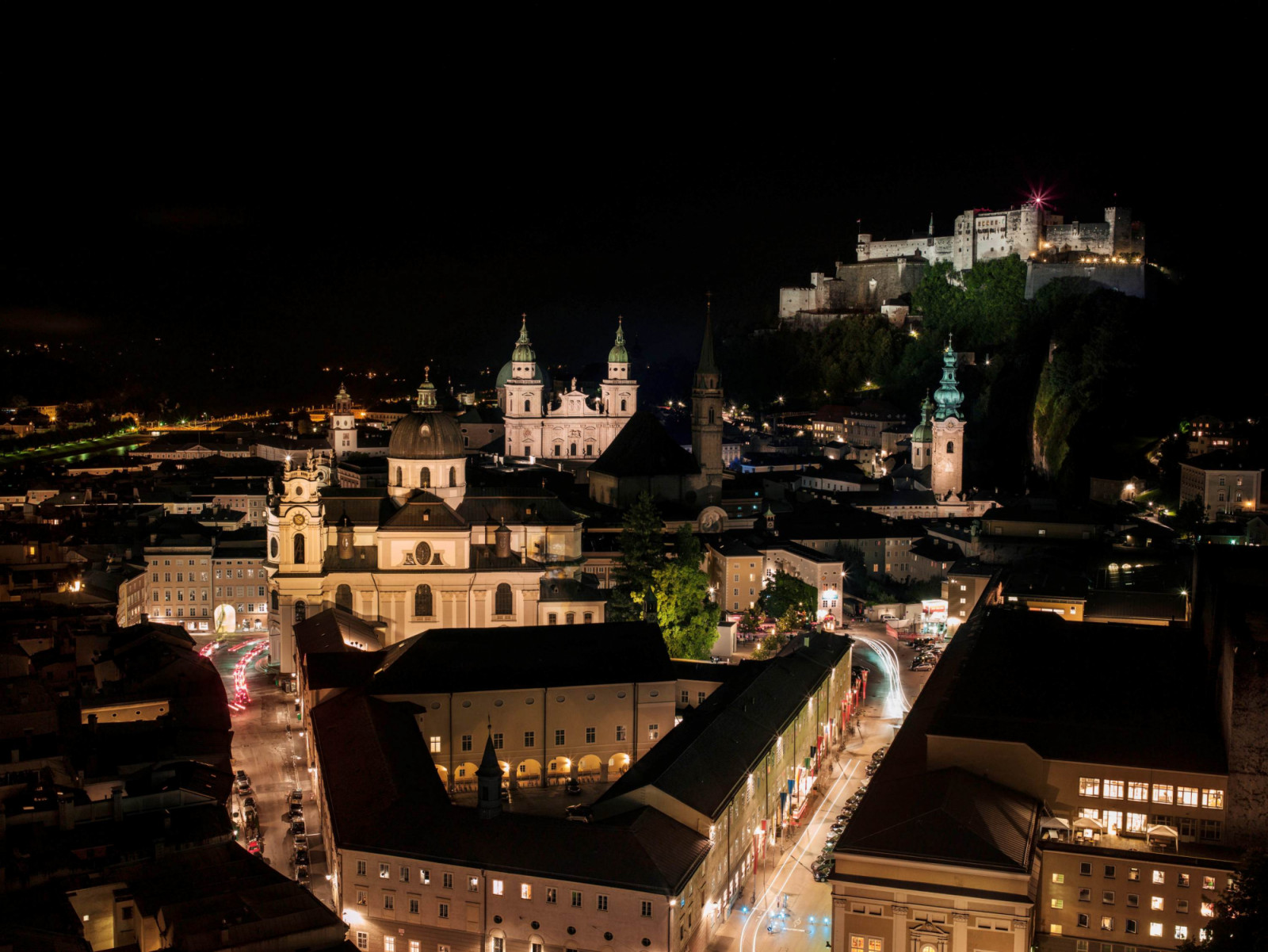 Salzburg’s historic streets at night. (Photo: courtesy of Ambroise Tezenas, Rolex)