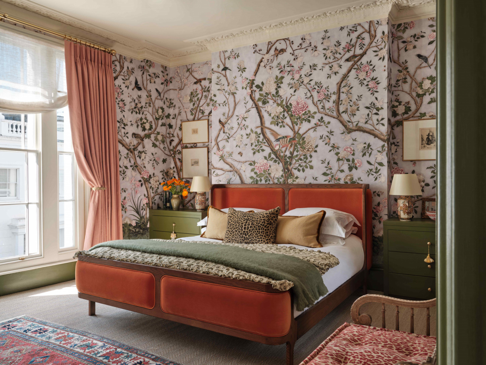 The principal bedroom feels romantic and immersive