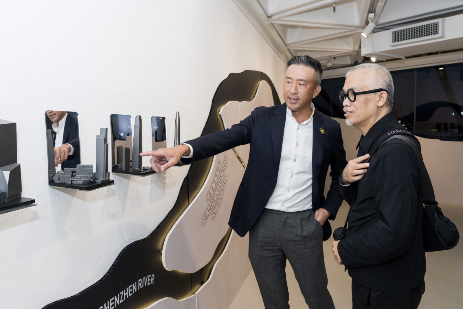Bryant Lu, vice chairman of Ronald Lu & Partners, and Stanley Wong (also known as “anothermountainman”) (Photo: courtesy of RLP Asia)
