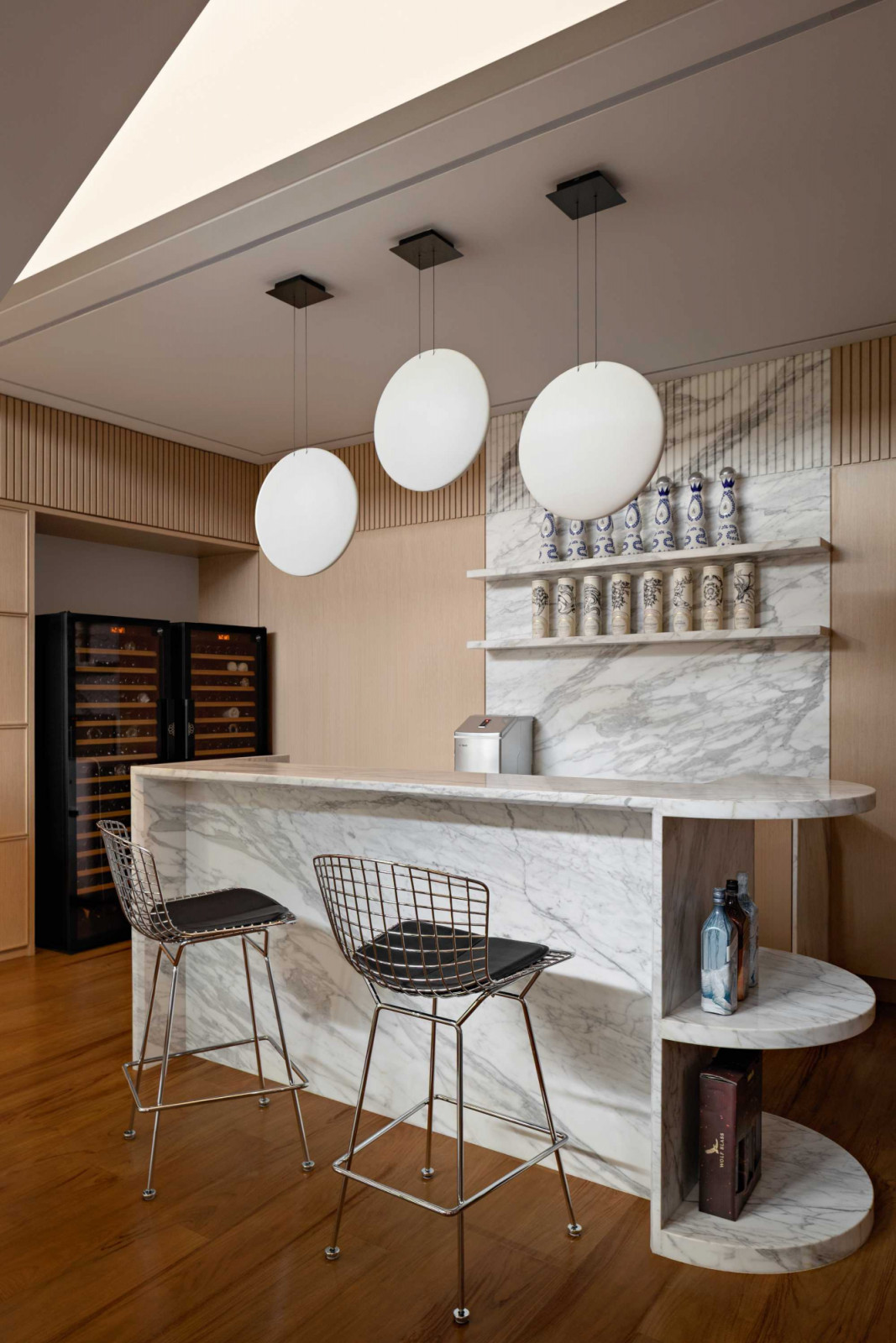 The generous application of marble brings good looks and durability to the private bar area on the second floor