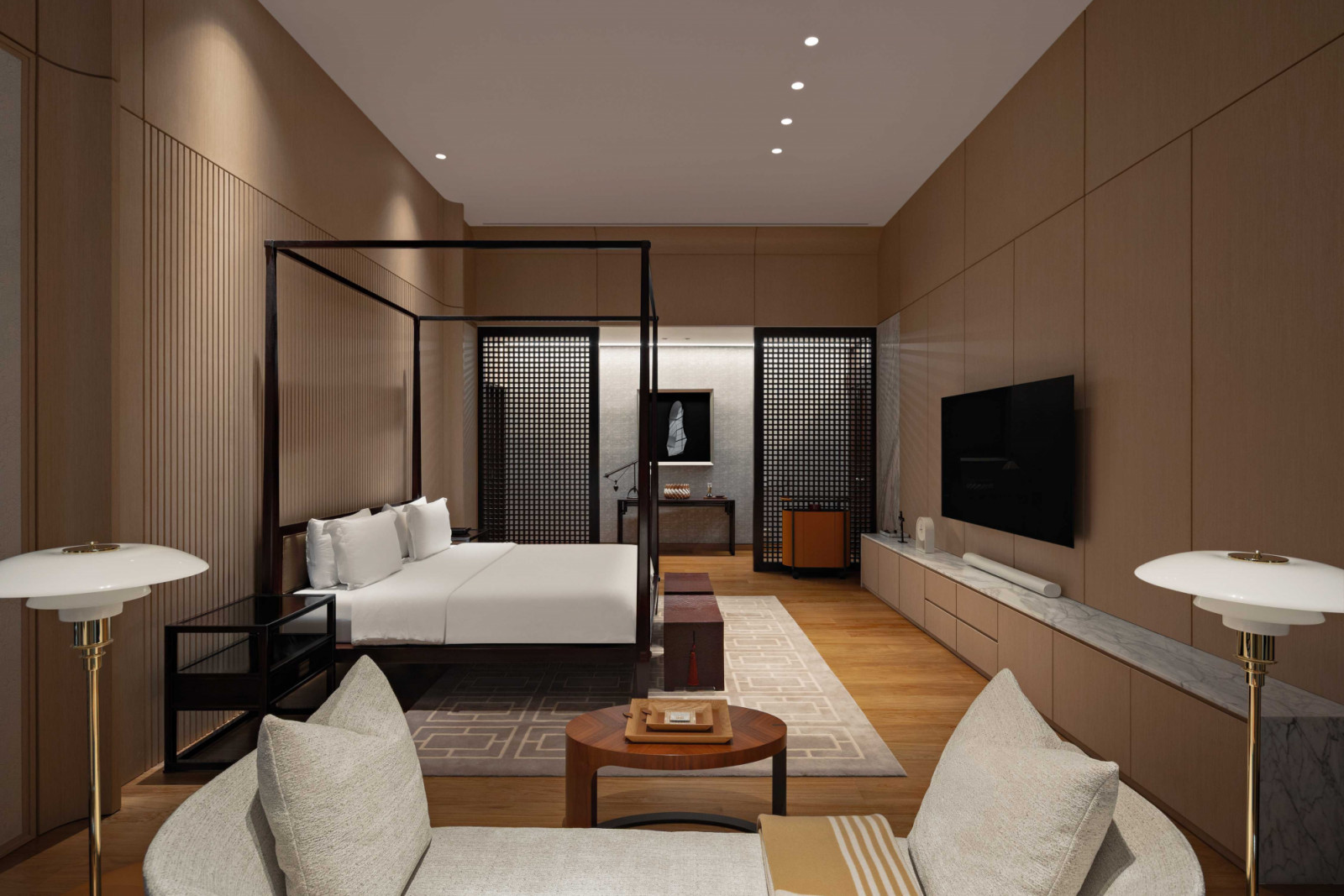 Another perspective of the master bedroom, which appears cosy despite its large scale