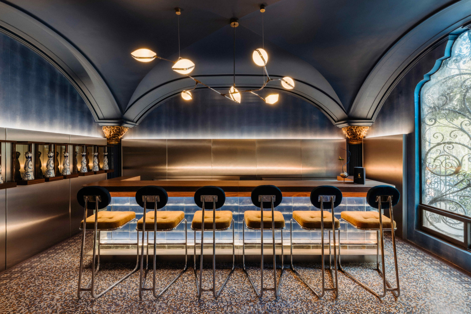 The cocktail bar extends the occasion into ‘sobremesa,’ the tradition of lingering after a meal