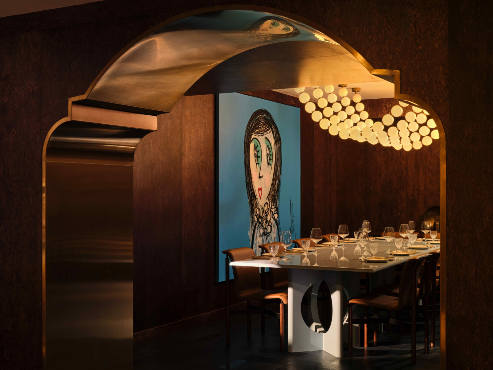 The private dining room welcomes up to 14 guests, centred around a custom-configured Pantheon table