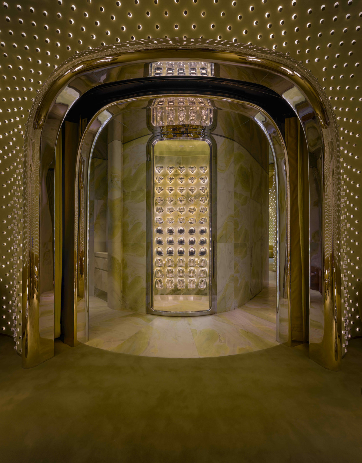 The bespoke stainless steel and marble bottle display