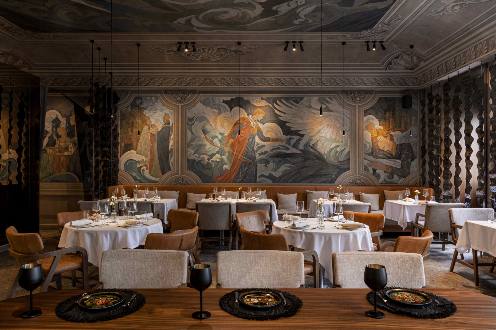 A hand-painted mural forms the artistic centrepiece that envelopes the restaurant