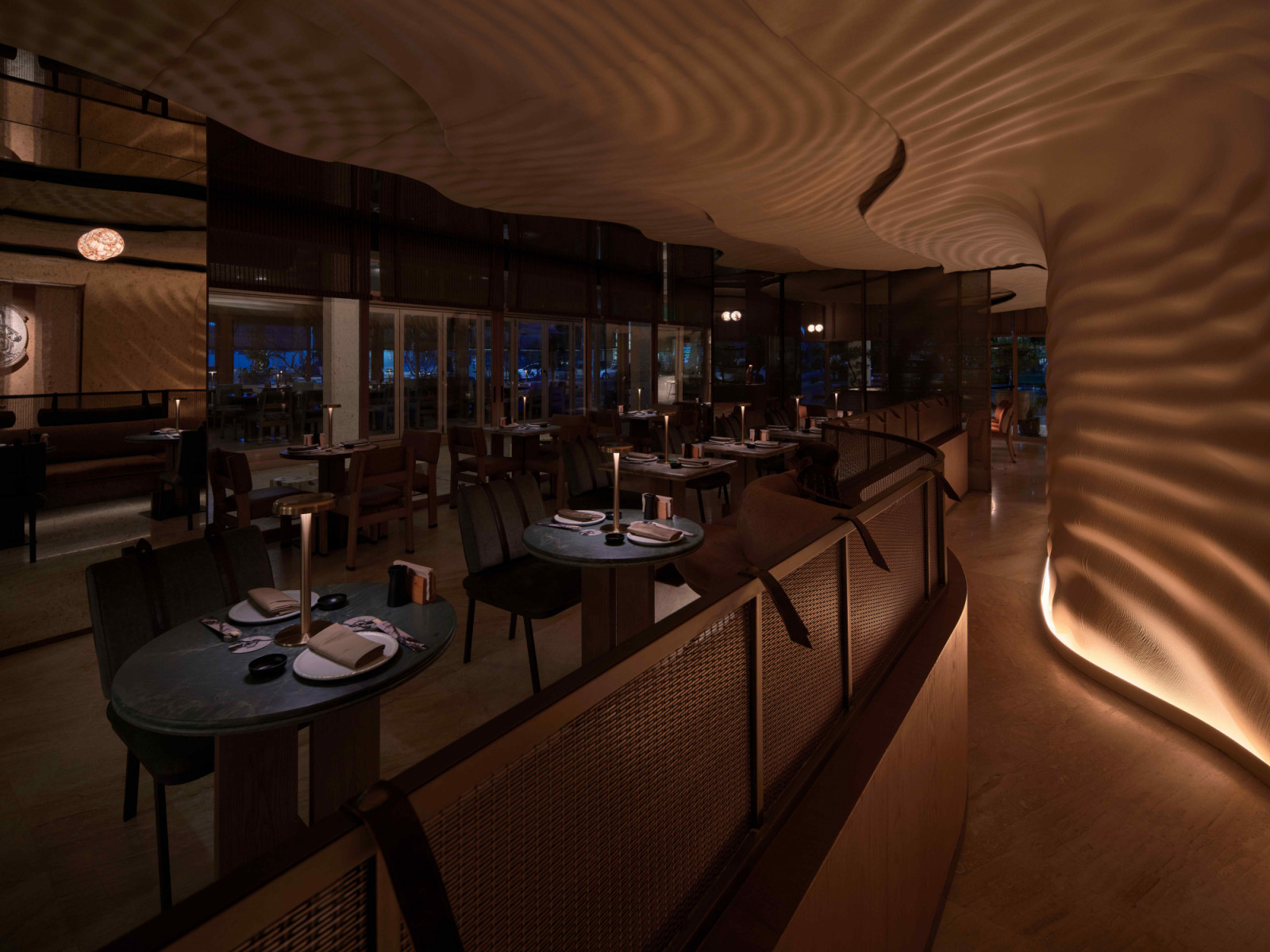 The sculptural interior was inspired by the sweeping brush strokes of Edo-era art