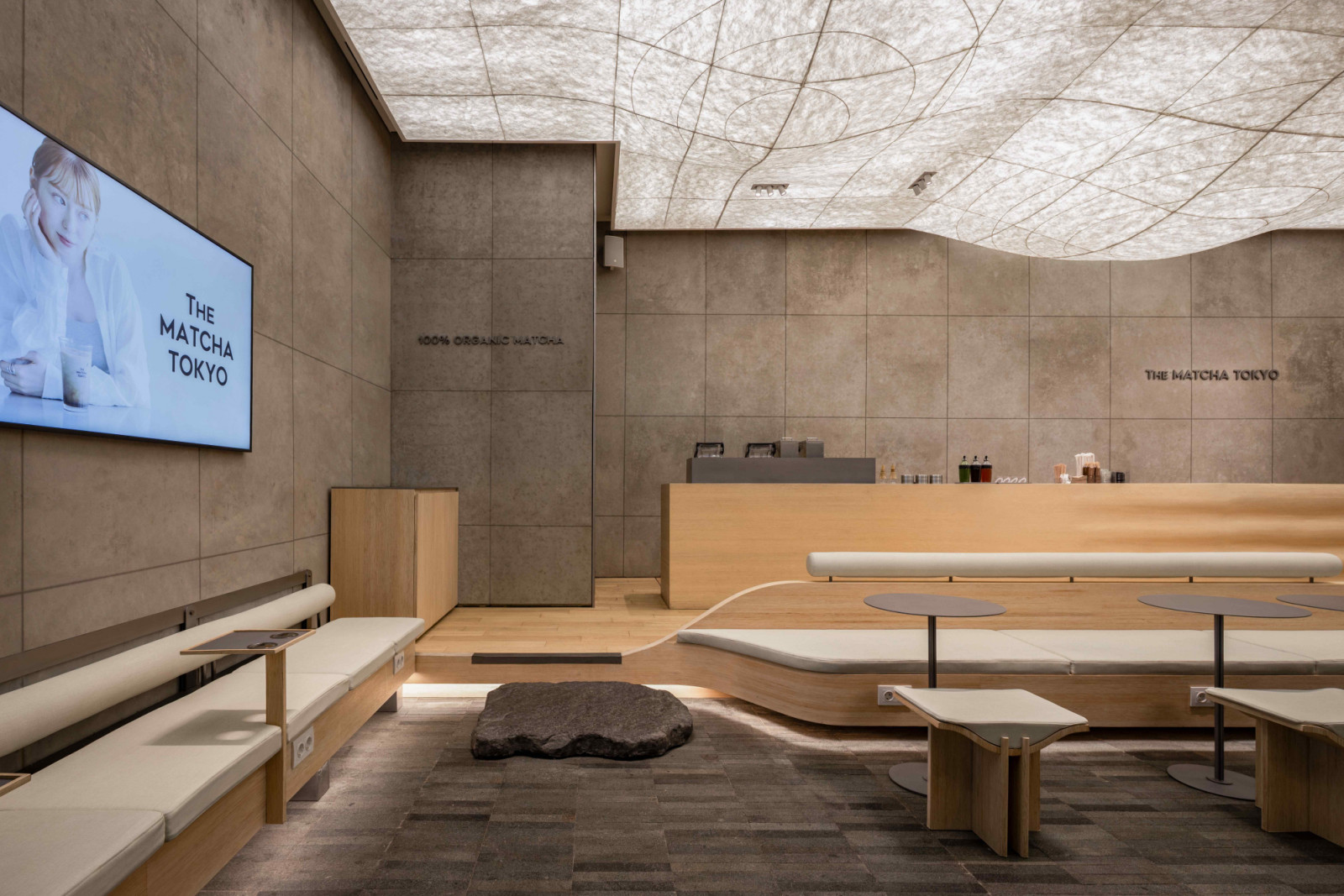 Andesite tiles ground the main floor, and stepping stones lead to a raised timber platform