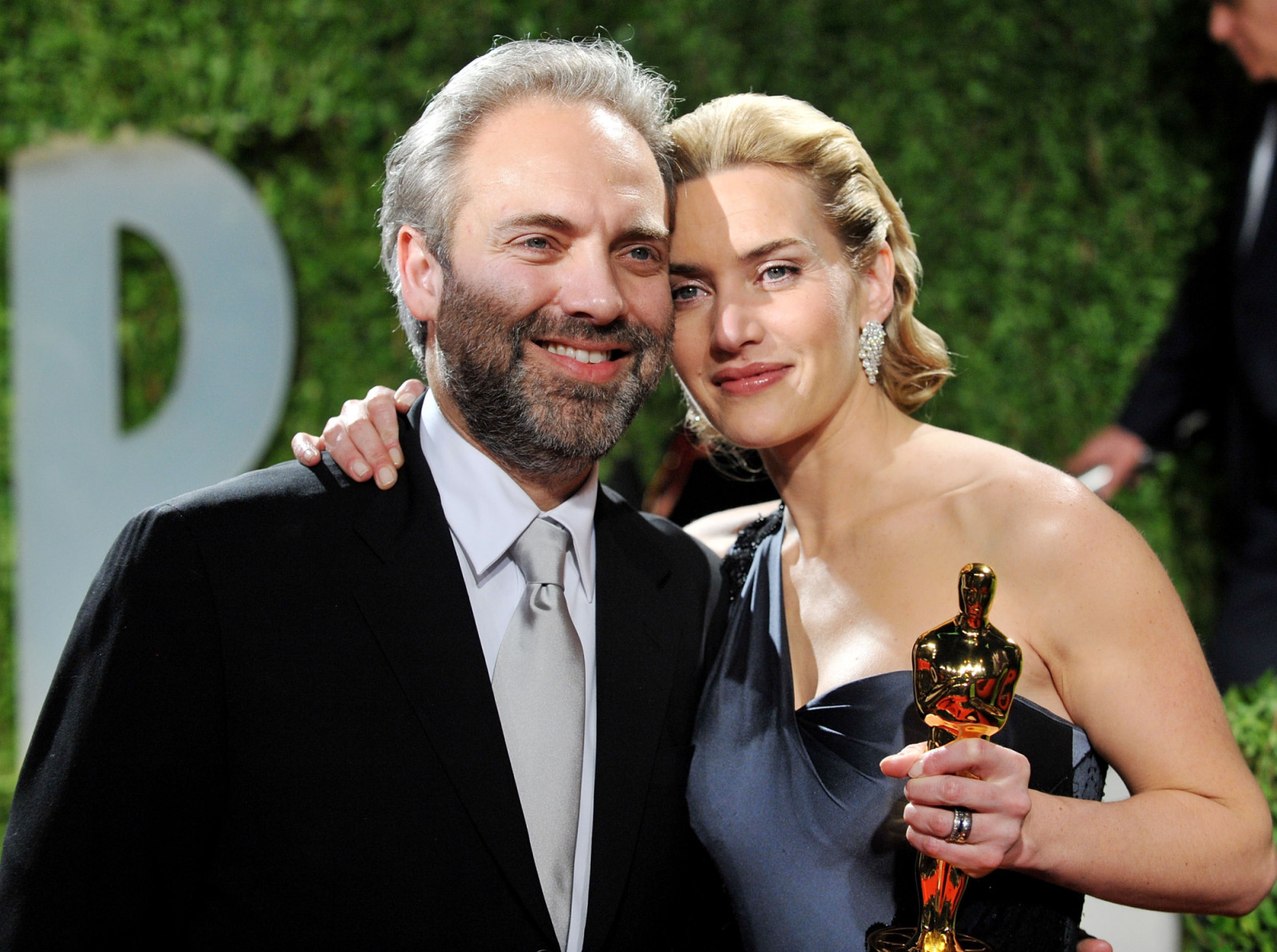 WEST HOLLYWOOD, CA - FEBRUARY 22:  Director Sam Mendes and wife actress Kate Winslet arrives at the 2009 Vanity Fair Oscar Party at the Sunset Tower on February 22, 2009 in West Hollywood, California.  (Photo by Jon Kopaloff/FilmMagic)