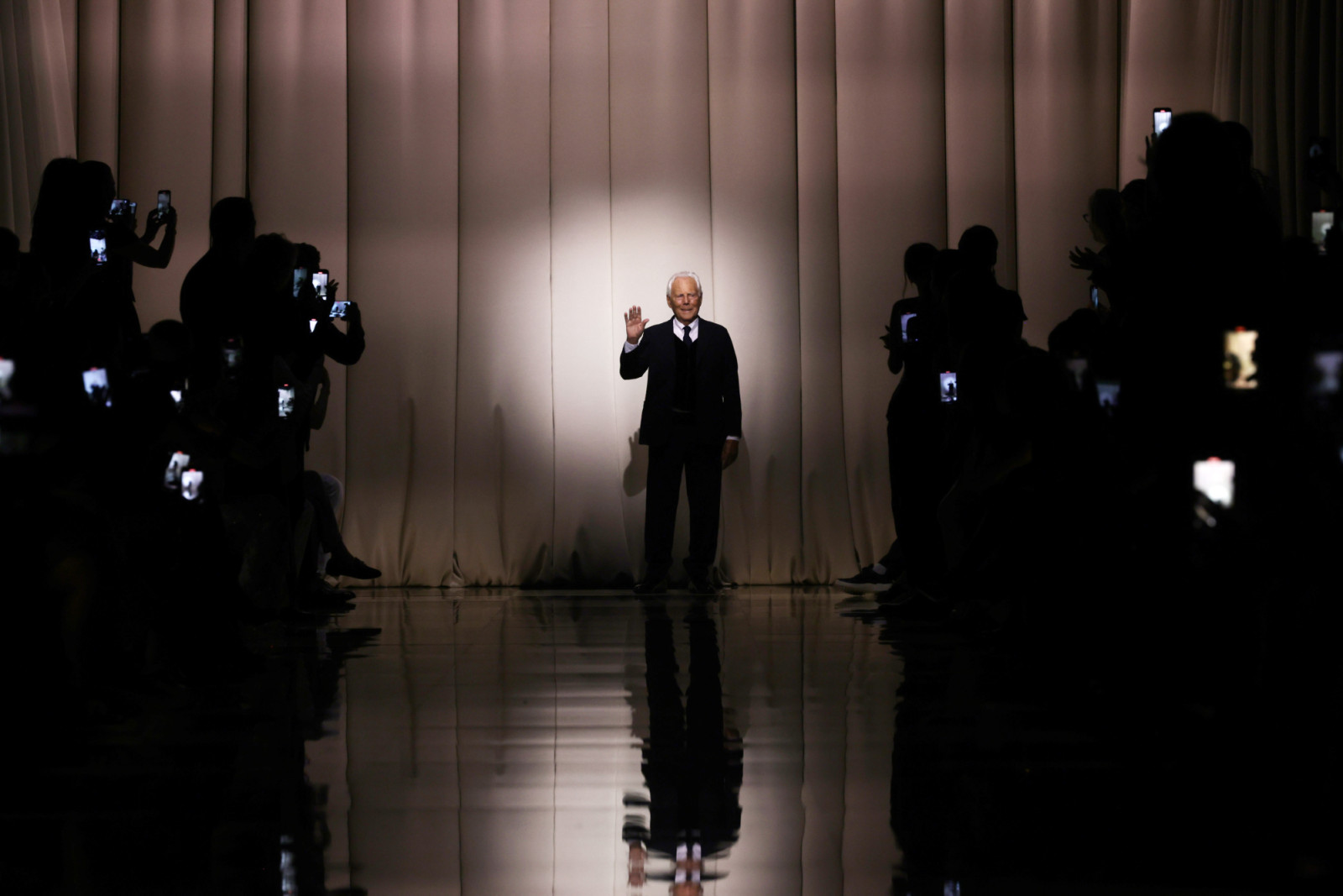 PARIS, FRANCE - JULY 04: (EDITORIAL USE ONLY - For Non-Editorial use please seek approval from Fashion House) Fashion designer Giorgio Armani acknowledges the applause of the audience after the Giorgio Armani Privé Haute Couture Fall/Winter 2023/2024 show as part of Paris Fashion Week on July 04, 2023 in Paris, France. (Photo by Pascal Le Segretain/Getty Images)